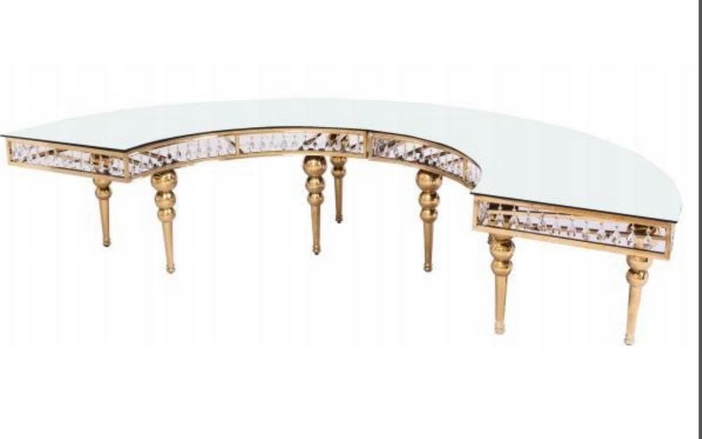 Curved gold serpentine banquet table